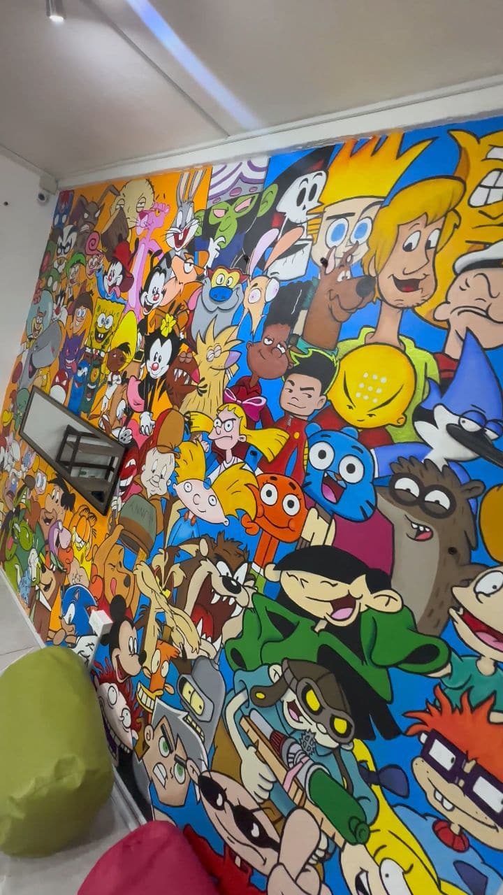 Cartoon mural painted on the wall of Soulraven Studios, Kingston